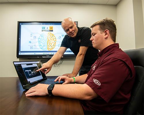 Image of Greg Francom instructing a student