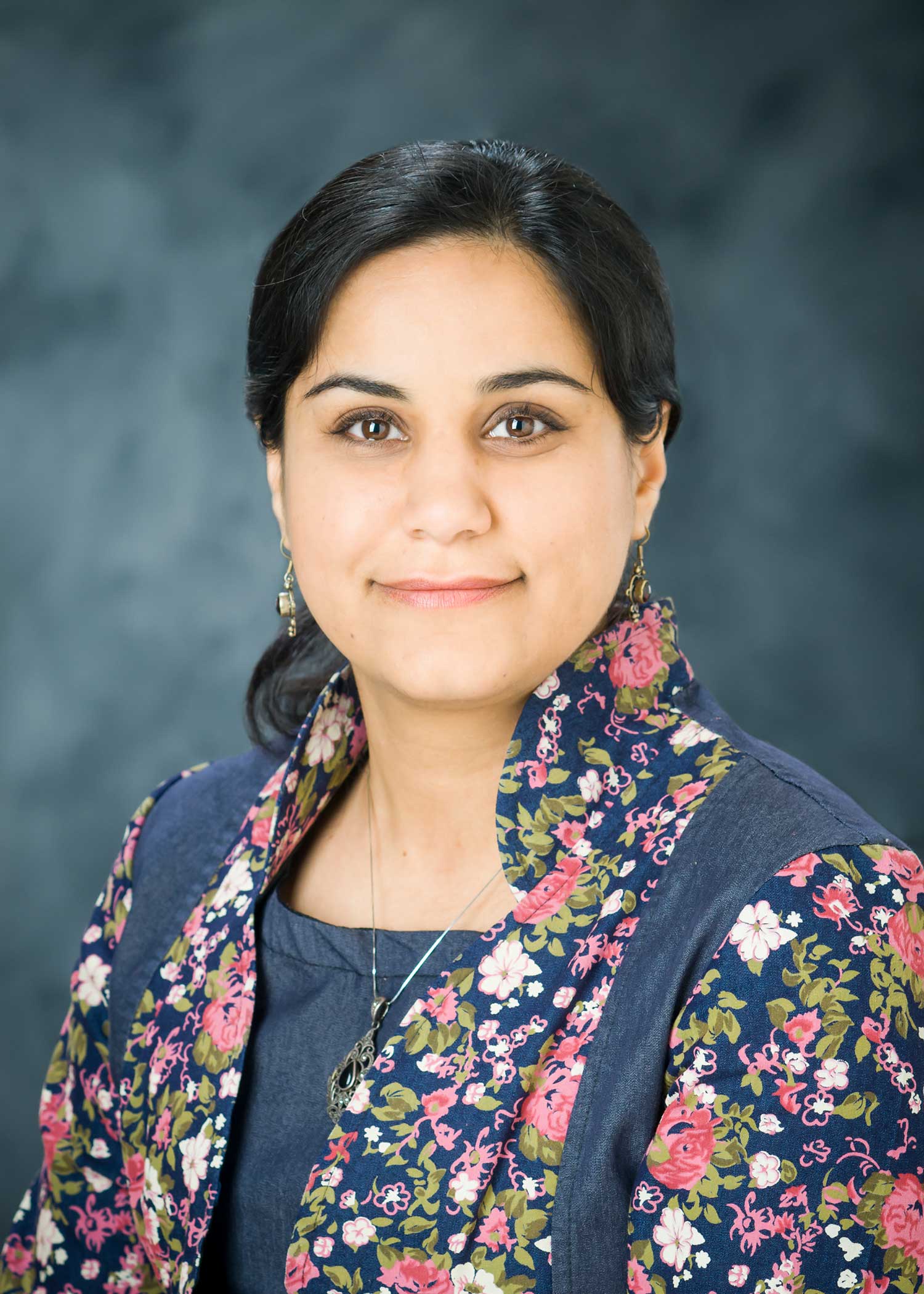 Headshot photo of Dr. Riahi